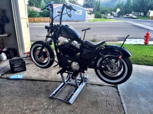 OTC 1545 Ultra Low Profile Motorcycle & ATV Lift – 1,500 lb (680 kg) Capacity, 3.5" Min Height, 17" Skids, Foot Pedal & Tie-Down Straps photo review